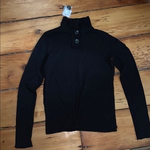 Long sleeve black top, high neck, buttons